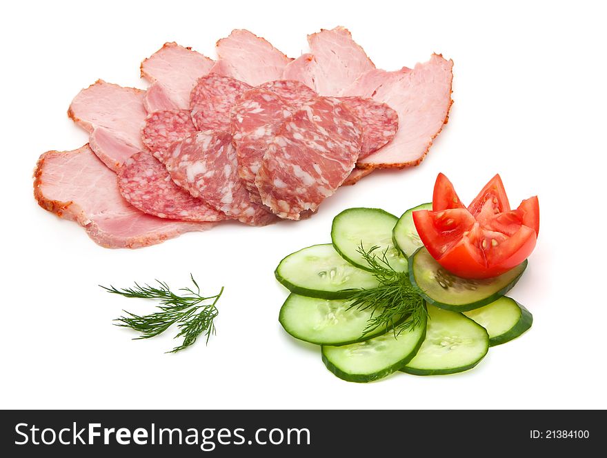 Sliced salami and ham with cucumber and tomato  isolated on a white background. Sliced salami and ham with cucumber and tomato  isolated on a white background