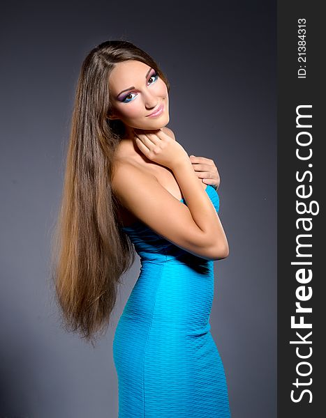 Girl in blue dress professionally makeup 1