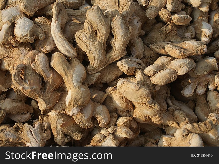 Heap of dry ginger on the market