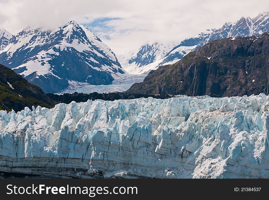 Close view of majestic and interesting glacial textures of Surprise Glacier in Harriman Fjord.