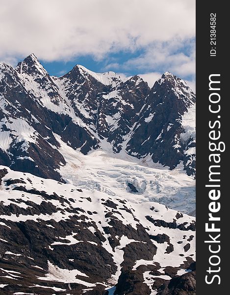 Closeup shot of glacier and ice on majestic mountain peaks. Closeup shot of glacier and ice on majestic mountain peaks.