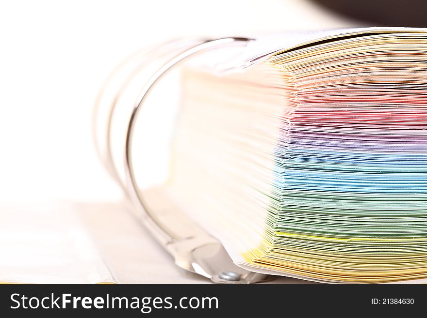 File folder with documents and papers isolated on white