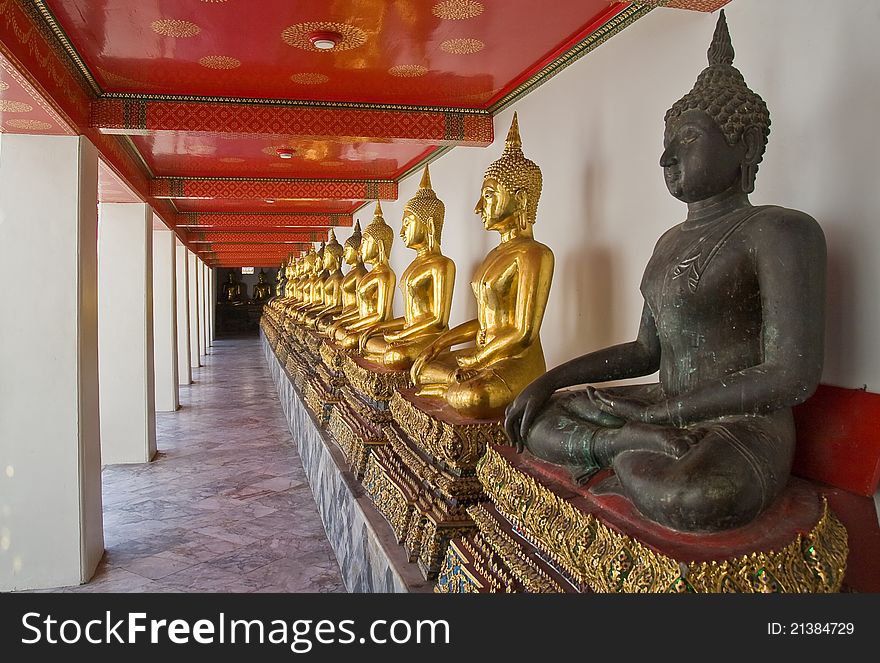 A row of golden buddha statue