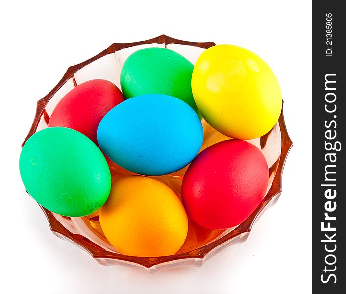 Many different color eggs over white background. Food