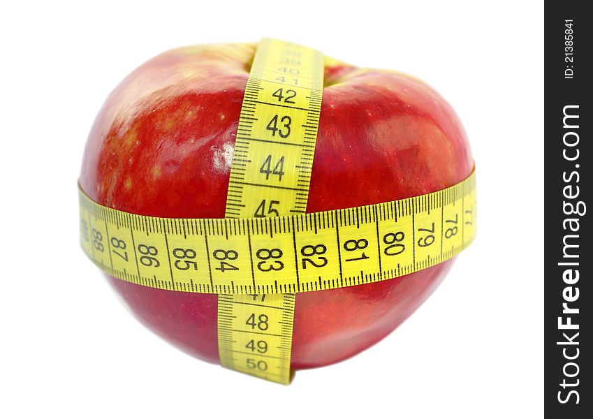 Apple and measuring tape isolated on white