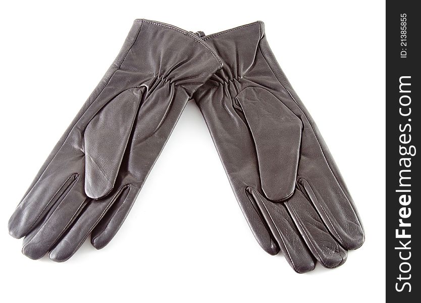 Two black leather gloves ower white background