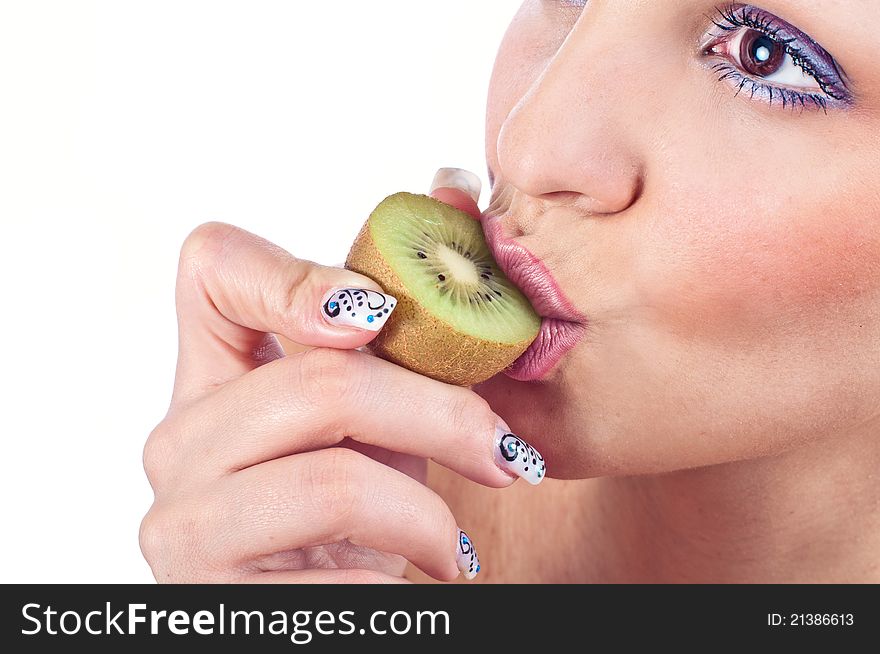 Close up photo of a woman with kiwi