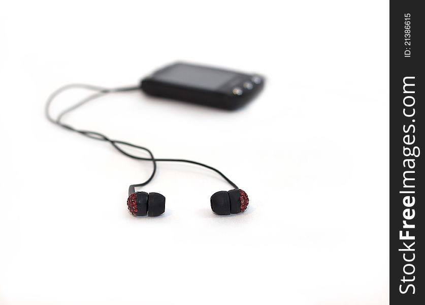 Earphones and player for music and radio. Earphones and player for music and radio.