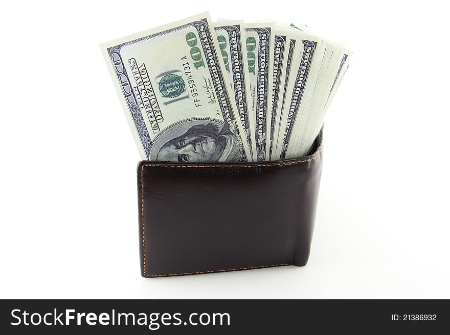 Money in brown leather purse isolated on white background