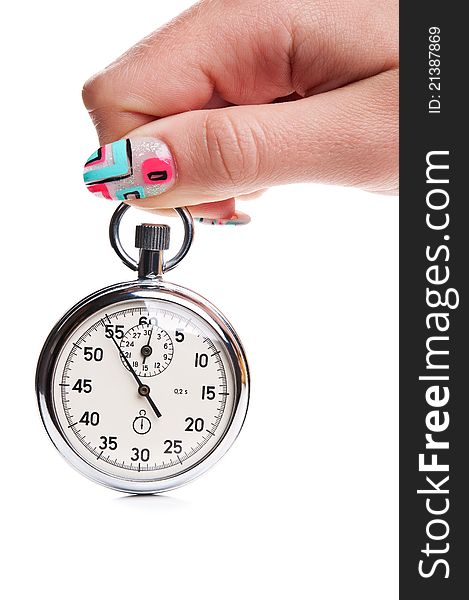 Woman with nice wanicure holding a stopwatch. Woman with nice wanicure holding a stopwatch