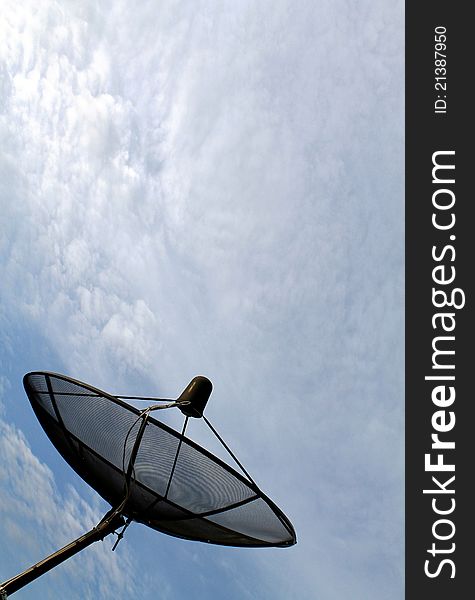Satelite dish on cloudy sky view