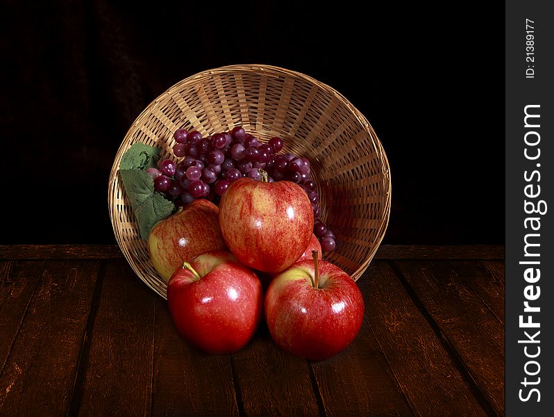 Small basket of apples and grapes. Small basket of apples and grapes