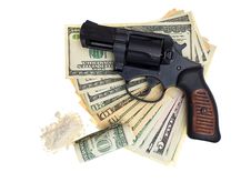 Handcuffs, Gun And Money Isolated Royalty Free Stock Photography