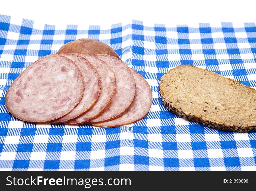 Sausage With Bread On Napkin