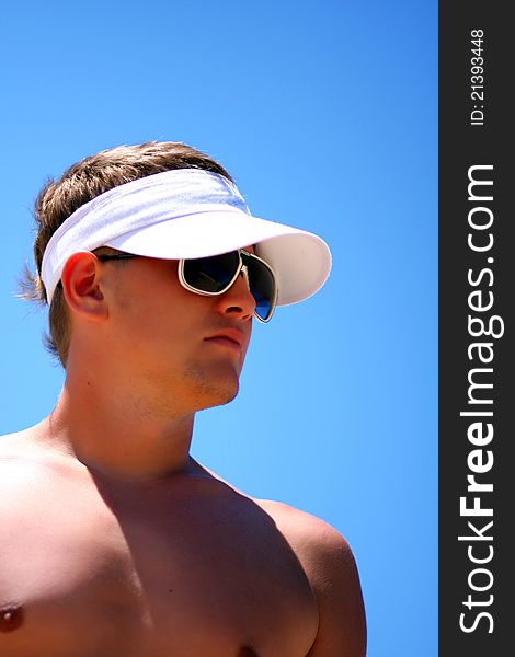 Attractive sports guy on the beach. Attractive sports guy on the beach