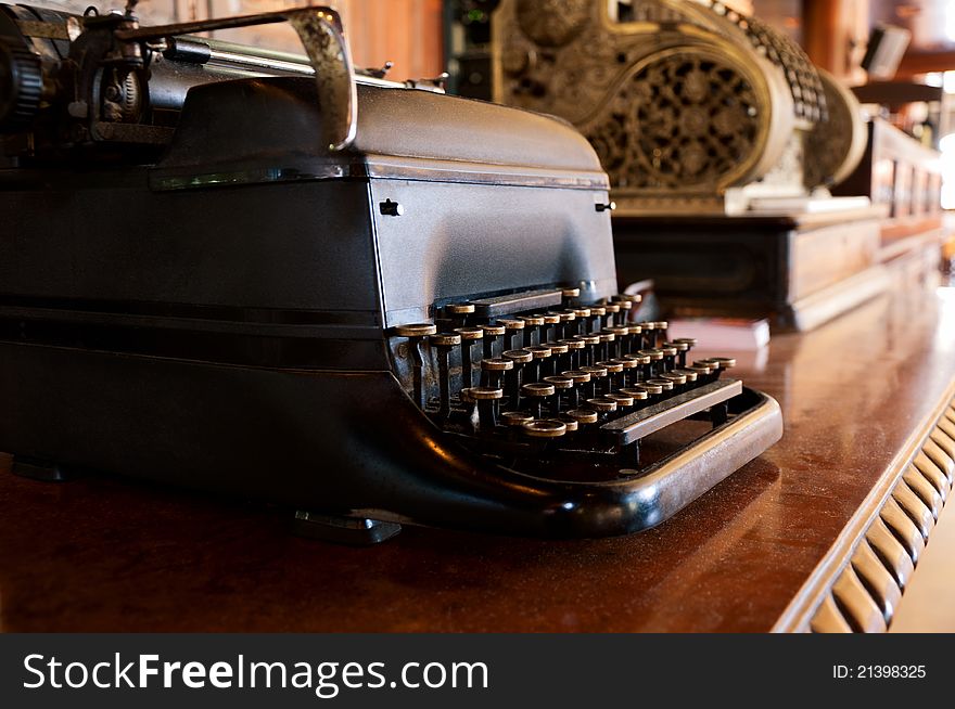 Old vintage typewriter on the brown table