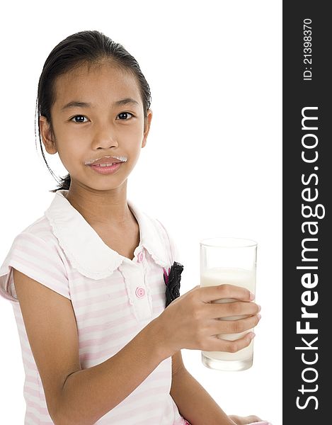 Asian teeny with a glass of milk, isolated on white background