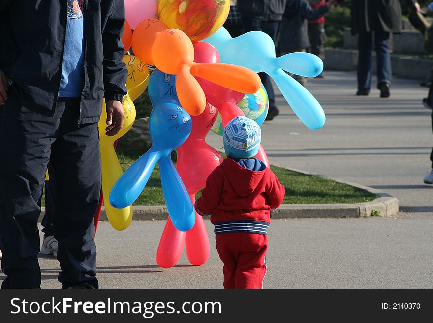 Kid runnig for a baloon