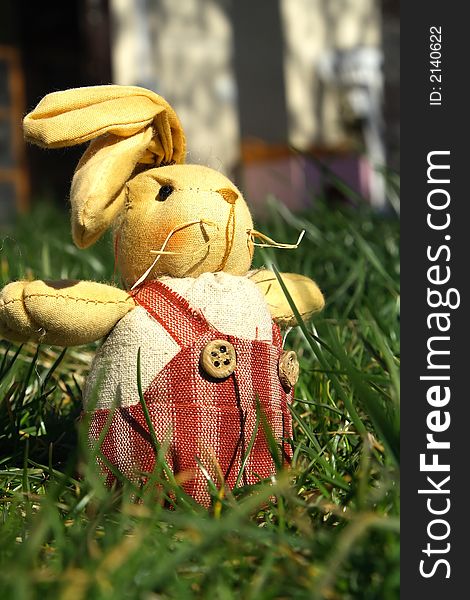 Beautiful textile easter rabbit with green background