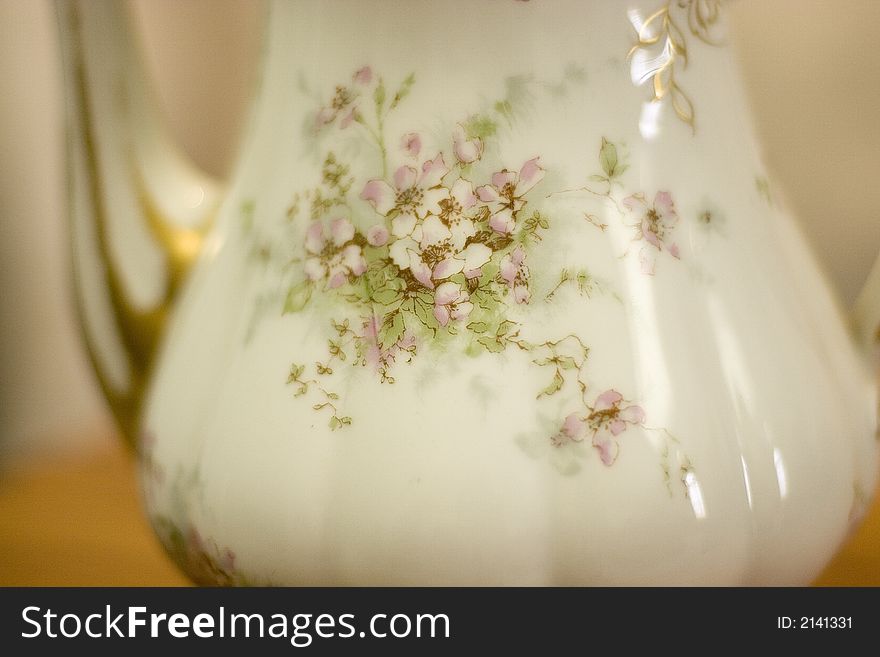 Antique gilded limoges coffee pot.  Floral Luxury item. Genteel. Bed and Breakfast, Tea Room object. Antique gilded limoges coffee pot.  Floral Luxury item. Genteel. Bed and Breakfast, Tea Room object.