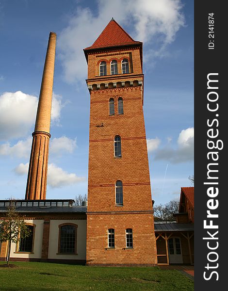 Chimney and tower n blue sky