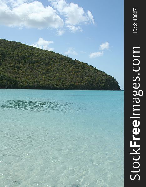 From high above, one can see the gorgeous layers of blue and green in the waters of Leinster Bay, St. John, USVI. From high above, one can see the gorgeous layers of blue and green in the waters of Leinster Bay, St. John, USVI.