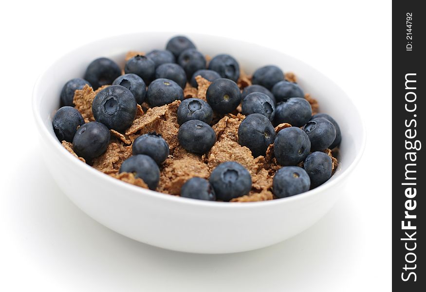 Bowl of cereal with fresh blueberries