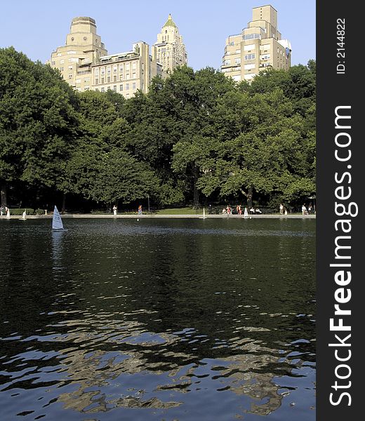 Mini sailing boats in the artificial lake of central parc in the city of New York, United States of America. Mini sailing boats in the artificial lake of central parc in the city of New York, United States of America