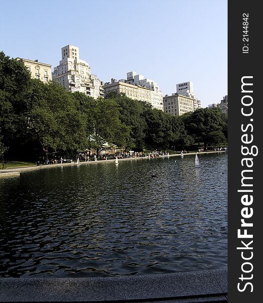 Mini sailing boats in the artificial lake of central park  in the city of New York, United States of America