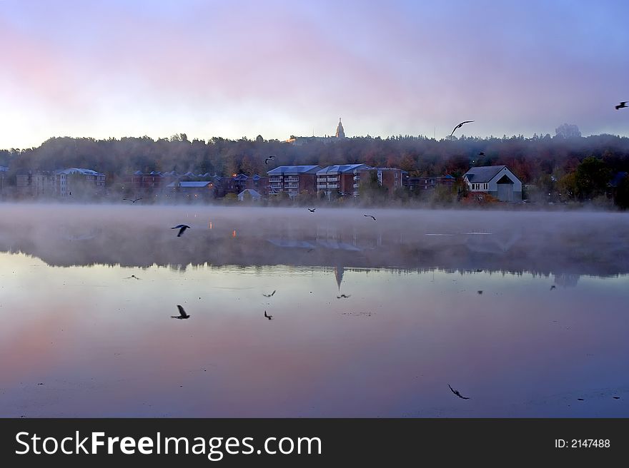 Sunrise in Quebec thawing the fall thin ice. Sunrise in Quebec thawing the fall thin ice