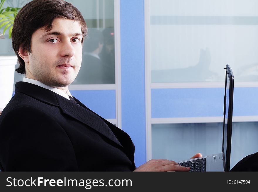 Portrait of a businessman in a working process. Portrait of a businessman in a working process