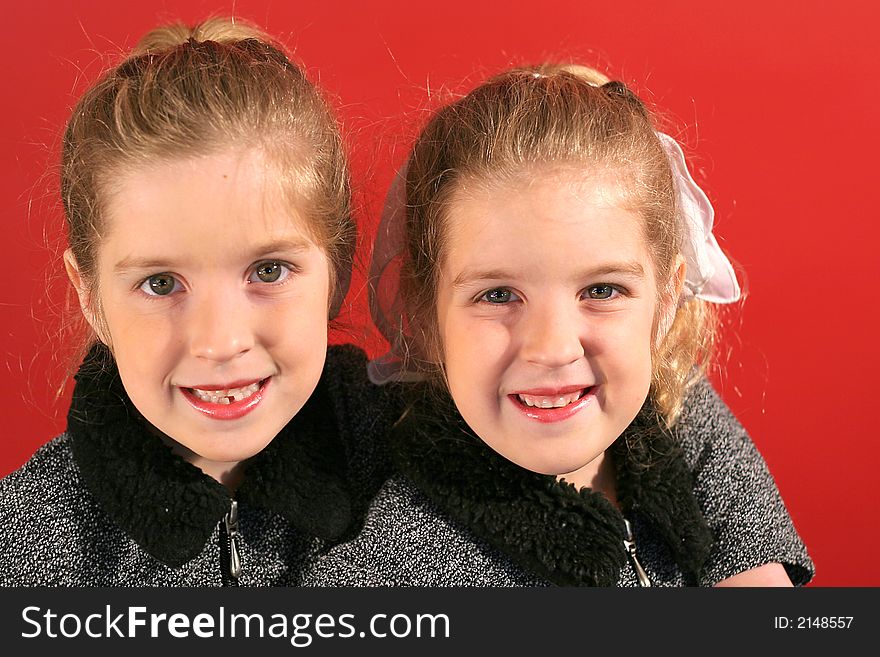 Shot of identical twin sisters together