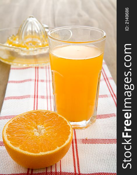 Freshy squeezed orange juice in a glass. Freshy squeezed orange juice in a glass