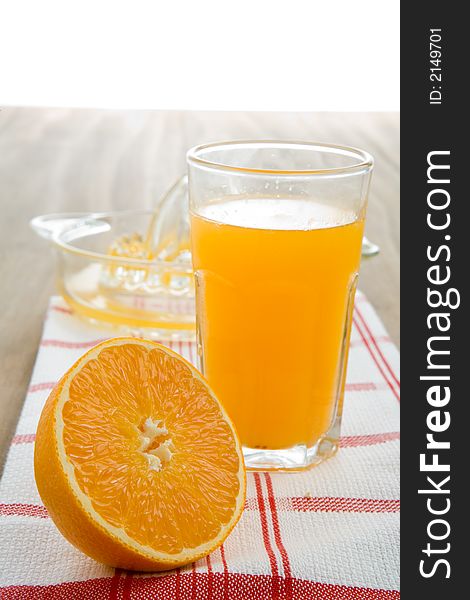 Freshy squeezed orange juice in a glass. Freshy squeezed orange juice in a glass