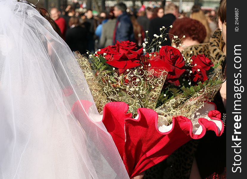 Bride with bouquet of red roses. Bride with bouquet of red roses