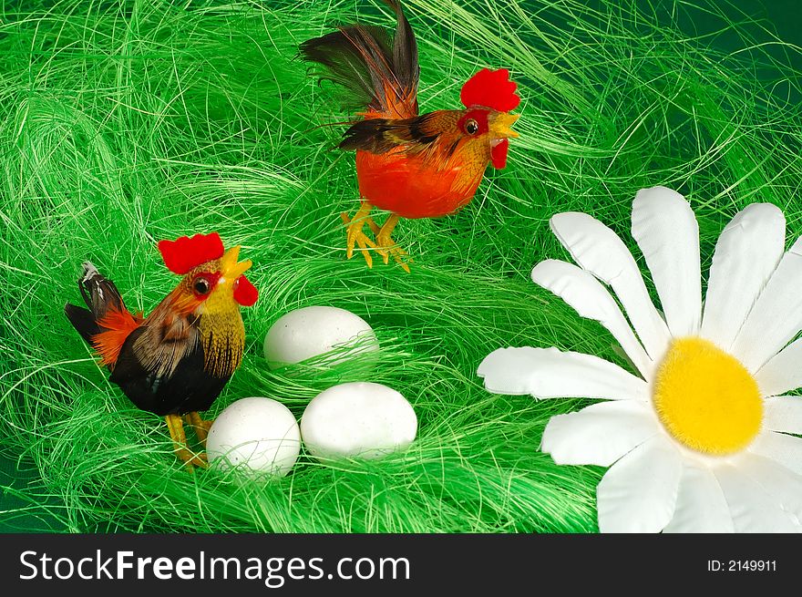 Easter chicken decorated on green grass. Easter chicken decorated on green grass