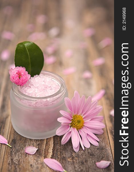 Aromatherapy salts & flowers - shallow depth of field. Aromatherapy salts & flowers - shallow depth of field