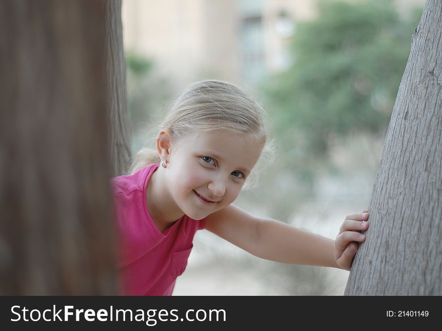 Children girl poses outdoors nature. Children girl poses outdoors nature