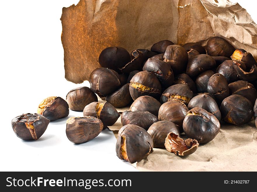 Handful of chestnuts roasted on a lot. Handful of chestnuts roasted on a lot