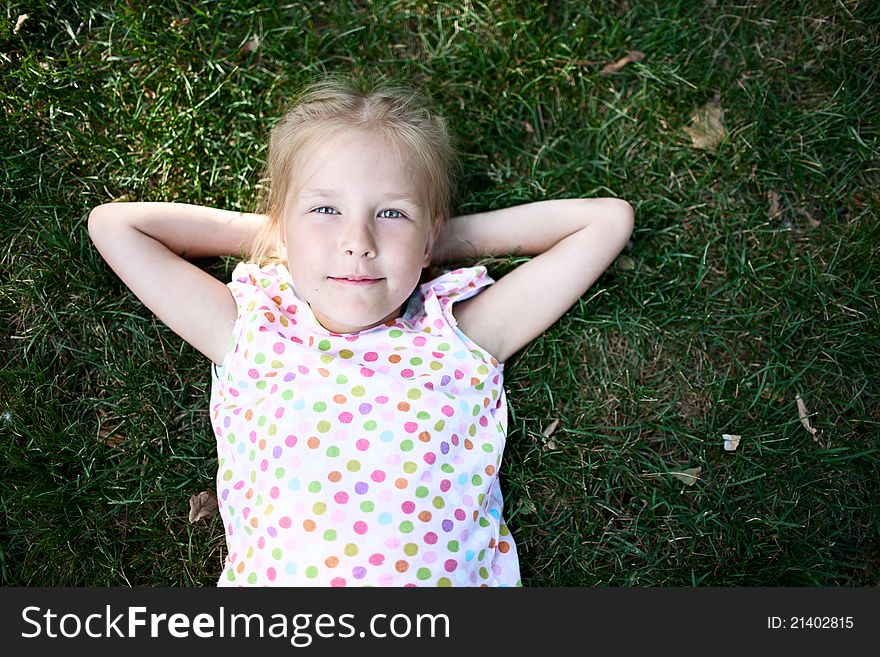 Little adorable girl on the grass. Little adorable girl on the grass