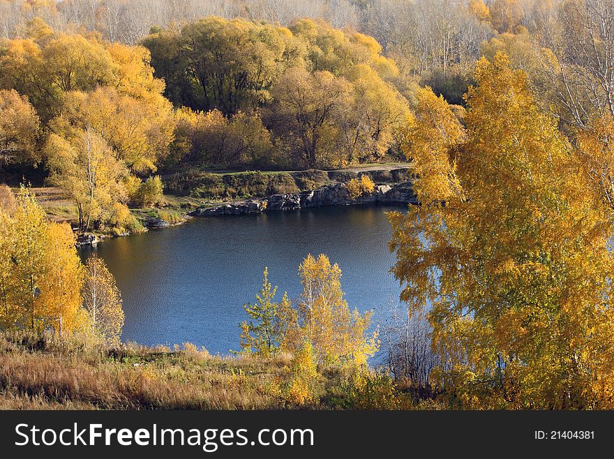 Lake surrounded with autumn trees. Lake surrounded with autumn trees.