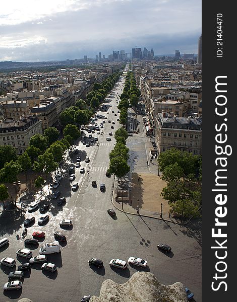 Paris view in sunny day from arc de triomphe triumph with the La Defence district on the horizon. Paris view in sunny day from arc de triomphe triumph with the La Defence district on the horizon