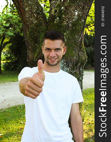 Man doing thumb up and smiling