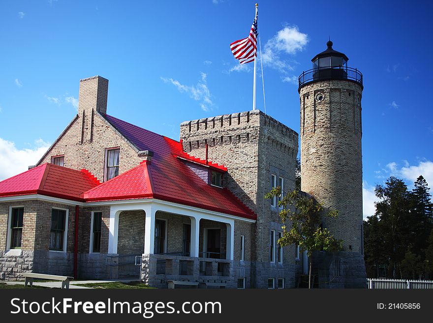 Lakeside view of the Old Lighthouse at Mackinac point. Lakeside view of the Old Lighthouse at Mackinac point