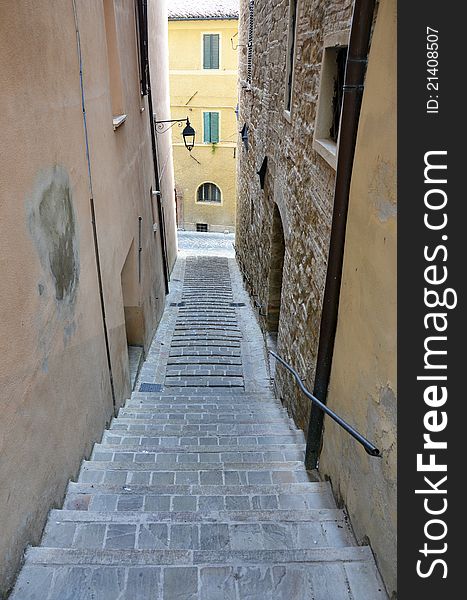 Narrow medieval street in Camerino city of Italy near Ancona and Macerata. Narrow medieval street in Camerino city of Italy near Ancona and Macerata