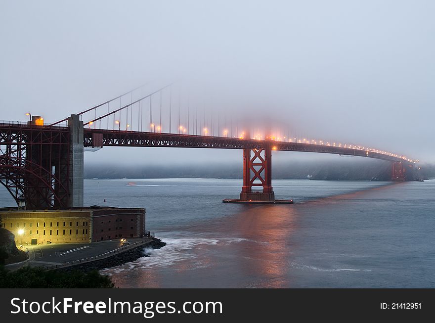 Taken from Marina side of the bay, during sunset and fog covering most of the bridge. Taken from Marina side of the bay, during sunset and fog covering most of the bridge