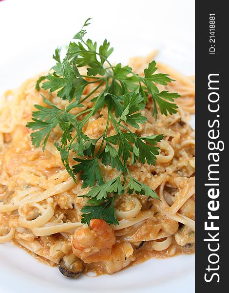 Gourmet seafood pasta served with parsley