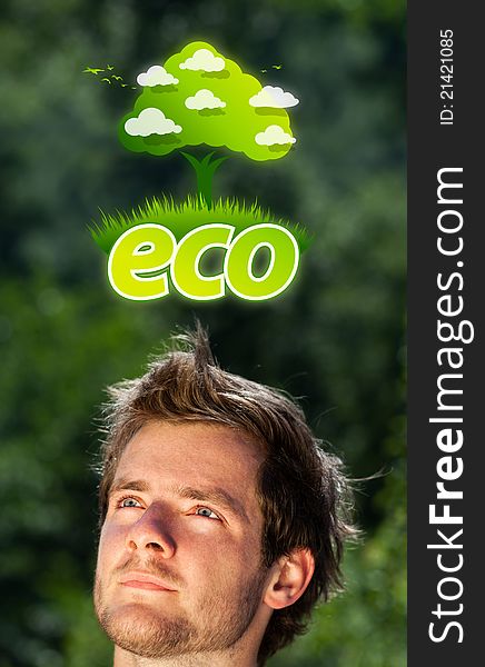 Young persons head looking at green eco sign. Young persons head looking at green eco sign
