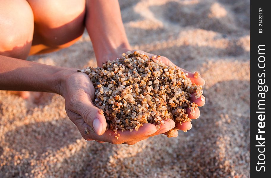 Beach; sand in human hands
