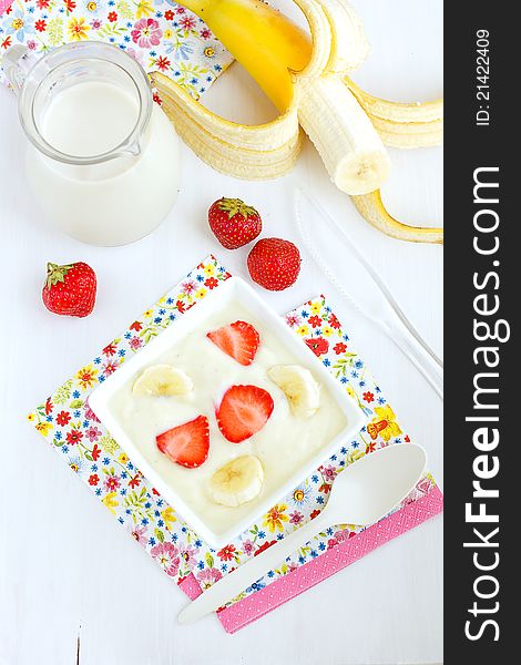 Soy yogurt and milk, strawberries and banana. Soy yogurt and milk, strawberries and banana